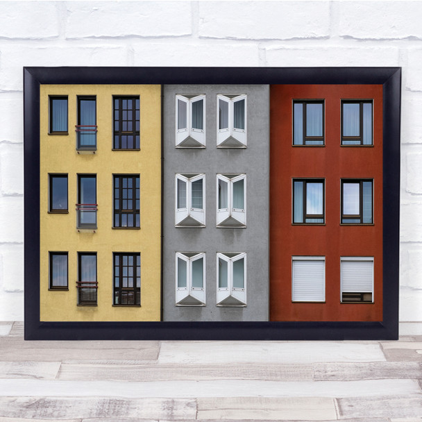 Building red yellow grey windows The Shape Of Colors Wall Art Print