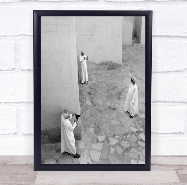 Photographers men in robes religious cobblestone Wall Art Print