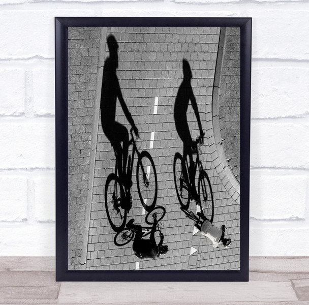 Moving Shadows cyclists sport bikes Wall Art Print