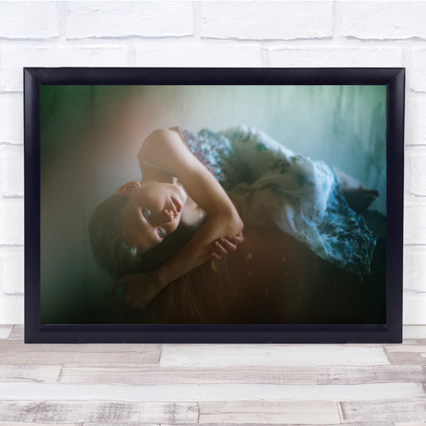 Woman Laying in dress holding arm Wall Art Print