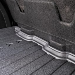Rear edge of DriveDen boot mat showing raised lip for Ford Kuga Mk.2 boot
