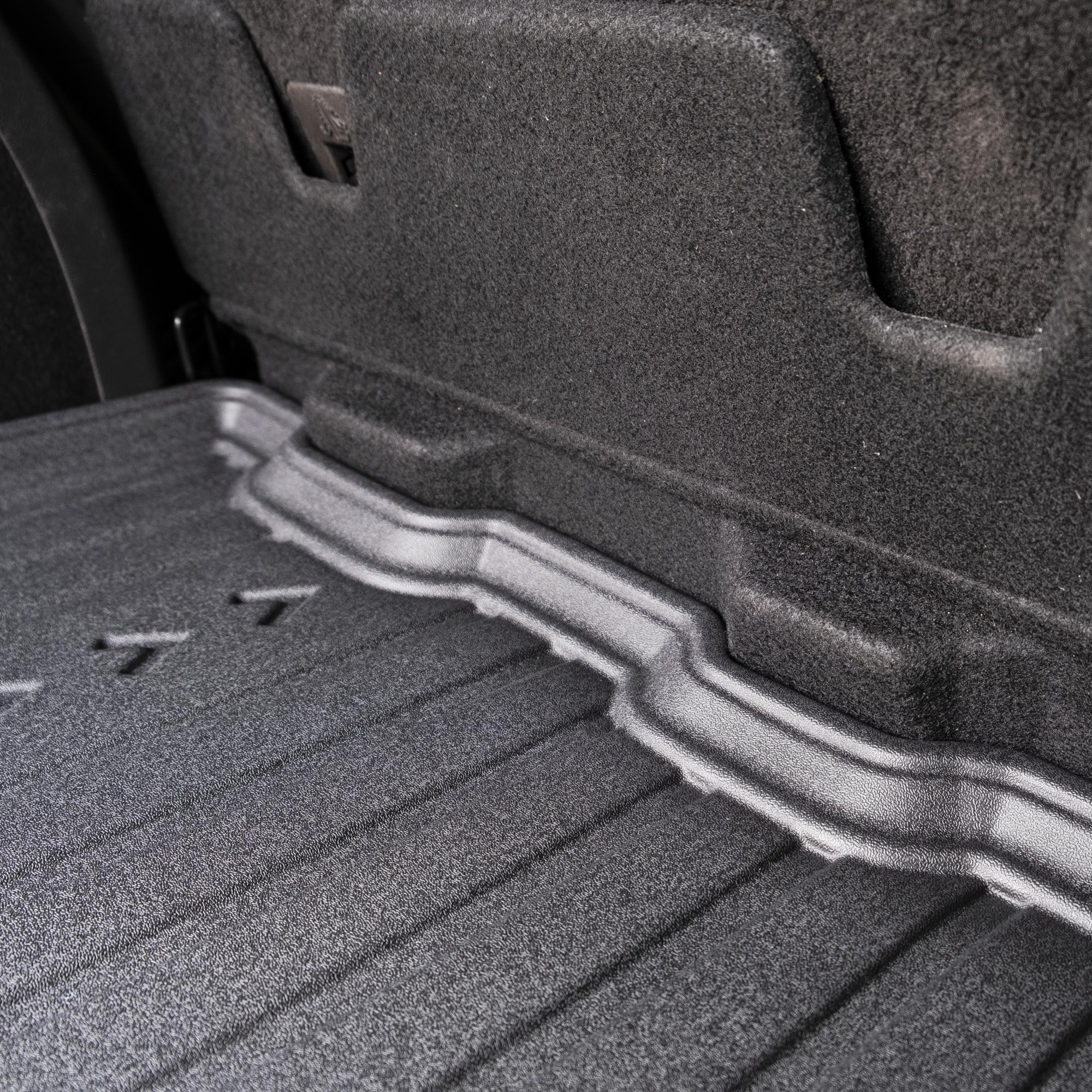 Rear edge of DriveDen boot mat showing raised lip for Ford Kuga Mk.2 boot