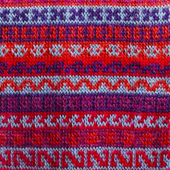 A Smooth-Knit Long Scarf Kicks it up a Notch with Geometric Details A Smooth-Knit Long Scarf Kicks it up a Notch with Geometric Details