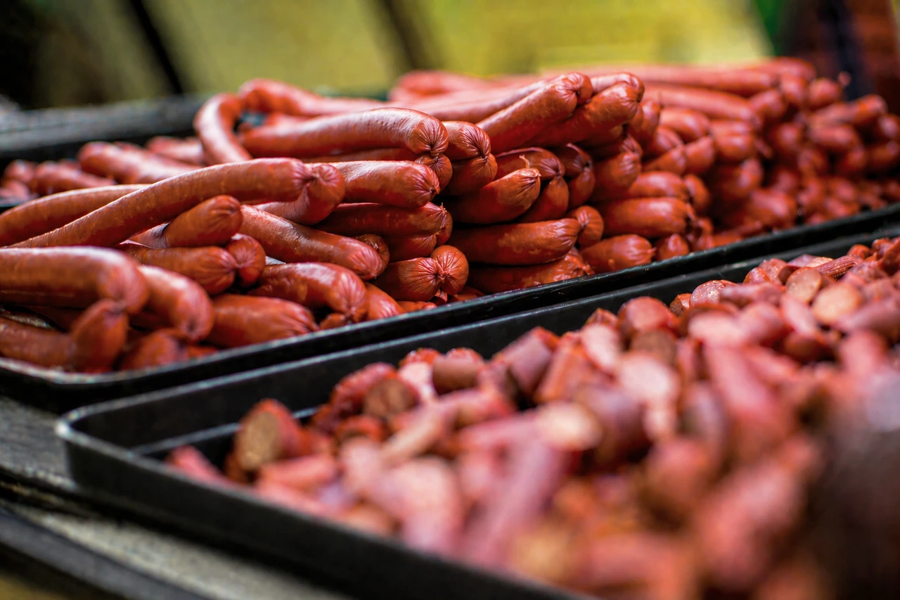 OUR FAMILY’S PASSION IS QUALITY MEATS. Image of sausage links.