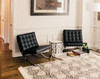 Ebro Leather Sofa Chair detail 1 — stainless steel frame with bridle leather straps