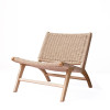 Chara Solid Wood Leather Armchair in home setting — Singapore