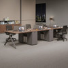 Integrated power solutions on Rizki manager table with in-desk sockets for laptops and office devices within arm's reach