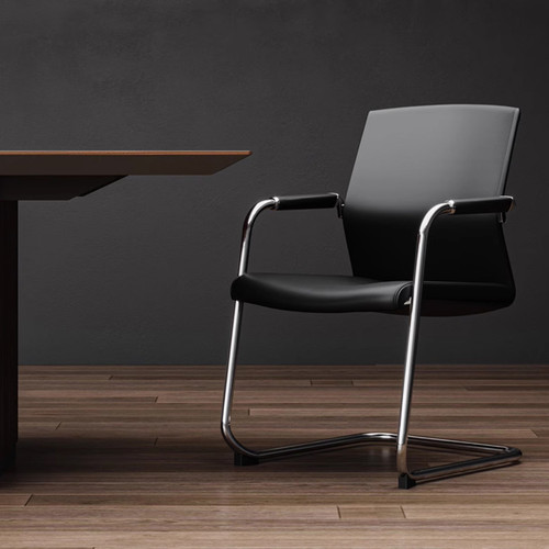 Ergonomic visitor chair beside office desk indoor shot | Eloise Ergonomic Office Chair Singapore | modern office, chrome cantilever frame