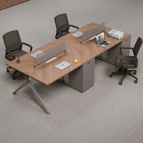 Rizki executive desk details showing E0 grade healthy panels, integrated in-desk sockets and reinforced carbon steel frame