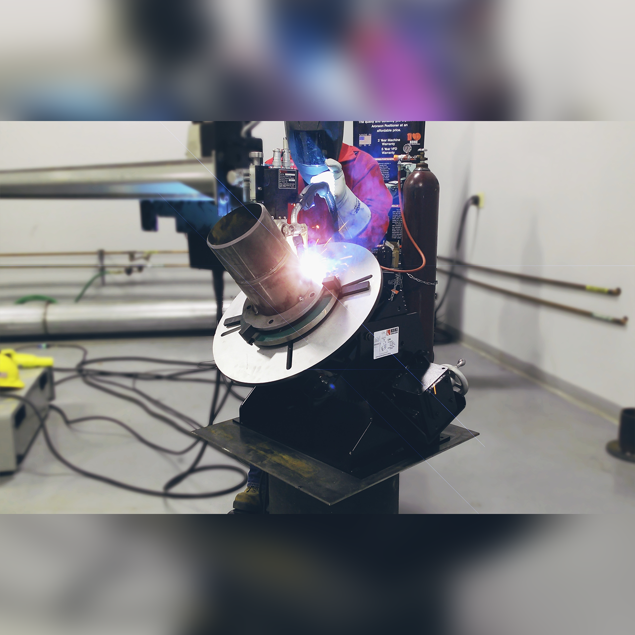 Koike Aronson LD4 benchtop welding positioner in use