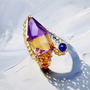 Unique women’s ring featuring large ametrine gemstone in yellow gold