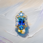 Unique women’s ring featuring blue-purple tourmaline with aquamarine and tanzanite