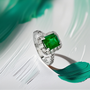 Profile view showing the ring setting and side diamonds