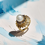 Unique women’s pearl and sapphire ring in vintage style