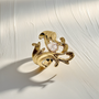 Elegant pear cut diamond ring with vintage inspired design