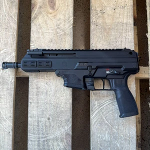 Springfield Kuna 9mm semi automatic pistol with 6 inch threaded barrel M-LOK handguard and black finish in store image left