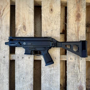 Grand Power Stribog SP9A3S 9mm pistol with folding brace, threaded barrel, and M-LOK handguard, in store image
