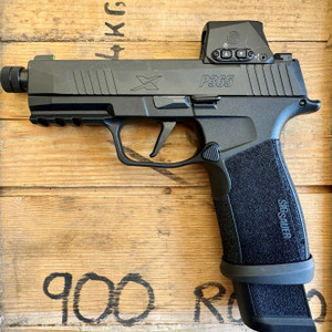 Sig Sauer P365 X Macro 9mm pistol with 4.3 inch threaded barrel, Romeo X optic, and black finish pointing to the left