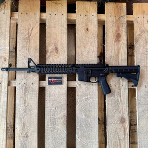 Bravo Company BCM MID-16 Mod 2 AR-15 rifle chambered in 5.56 NATO with 16-inch barrel, QRF Picatinny handguard, and BCM SOPMOD stock, in store image