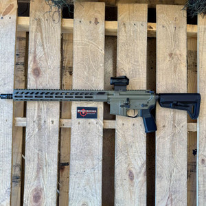 Sig Sauer M400 FORGE AR-15 rifle in OD Green with 16-inch cold hammer forged barrel, ROMEO-MSR Gen II red dot, and free-float aluminum handguard, in store image pointed to the left
