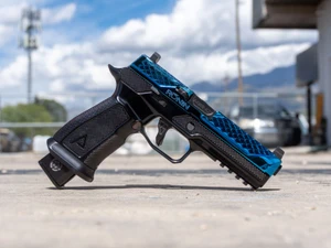 SIG SAUER x Agency Arms x Ronin Tactics P320 WATER 9mm pistol featuring Dragon Scale slide serrations, Agency Optic System, Icarus Precision billet grip module, and Agency Arms match-grade barrel.
