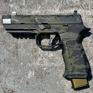 Agency Arms x Sage Dynamics P320 9mm pistol in MultiCam Black featuring the Agency Optic System, Sage compensator, Icarus Precision grip module, and suppressor-height sights.