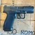 CANiK METE MC9 Prime compact 9mm pistol with compensated slide, optics-ready design, and night sights, in store image, pointing to the right