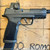Sig Sauer P365 X Macro 9mm pistol with 4.3 inch threaded barrel, Romeo X optic, and black finish pointing to the right