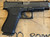 Glock 48 MOS optics ready 9mm compact pistol with Glock Marksman Barrel and slimline frame pointing to the right