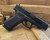 Glock 48 MOS optics ready 9mm compact pistol with Glock Marksman Barrel and slimline frame angled downward