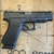 Glock 48 MOS 9mm optics ready slimline pistol with 4.17 inch Glock Marksman Barrel pointing to the right, in store image