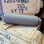 HUXWRX FLOW 7.62 Ti suppressor in flat dark earth with Flow-Through technology and included 5/8x24 muzzle brake, in store image sideways