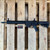 LWRC IC-SPR AR-15 rifle chambered in 5.56 NATO with 14.7-inch cold hammer-forged NiCorr barrel, piston system, monoforge receiver, and black finish, in store image