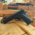 Kimber 1911 Custom LW .45 ACP pistol with threaded barrel, optics-ready slide, suppressor-height sights, and textured rubber grips, in store image, angled