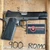 Kimber Custom LW 1911 pistol chambered in .45 ACP with 5-inch barrel, KimPro Black aluminum frame, and white dot sights., in store image pointing to the right