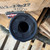 AAC Ti-RANT 9M HD modular 9mm suppressor with Black PVD finish, titanium and stainless steel construction, configurable full or compact length, and multi-caliber compatibility, in store image top down tip view