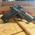 Sig Sauer P226 XCarry Legion DA/SA 9mm pistol in Legion Gray featuring a Romeo-X Compact red dot, X-RAY3 night sights, G10 grips, optics-ready slide, and accessory rail, in store image angled downward and to the right