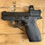 Smith & Wesson Bodyguard 2.0 .380 ACP micro-compact pistol with Viridian RFX1 green dot optic, tritium front sight, flat-face trigger, and Armornite finish, in store image