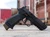 Agency Arms x Sage Dynamics SIG Sauer P320F 9mm pistol in black featuring the Agency Optic System, integrated Sage compensator, Icarus Precision grip module, and suppressor-height sights.