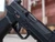 Agency Arms x Sage Dynamics SIG Sauer P320F 9mm pistol in black featuring the Agency Optic System, integrated Sage compensator, Icarus Precision grip module, and suppressor-height sights, zoomed right side
