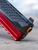 Agency Arms x Ronin Tactics SIG P320 9mm pistol featuring Dragon Scale slide serrations, Agency Optic System, Icarus Precision billet grip module, match-grade barrel, and suppressor-height sights, in store image zoomed in on the barrel
