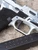 Agency Arms Modified Glock 45 Gen5 9mm Urban Arctic Camo pistol zoomed in on right side trigger