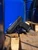 Canik METE MC9 Prime Radian 9mm black pistol with Radian RAMJET barrel and AFTERBURNER compensator, outside against blue background