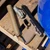 HK Mark 23 FDE 45 ACP suppressed package with Flat Dark Earth Rugged Obsidian 45, SureFire X300 Turbo and Picatinny rail adapter.