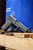 HK Mark 23 .45 ACP pistol with 5.87 inch threaded barrel in black, close up
