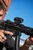 HK SP5 9mm pistol with SBT5 folding brace, TiTrex-360Ti suppressor, Holosun ARO EVO optic and Midwest Industries handguard aimed outward