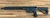 Tier 1 Kinetics M8 Utility Black Edition 16-inch rifle with Geissele MK14 rail and Magpul DT stock, in store image top down view left side