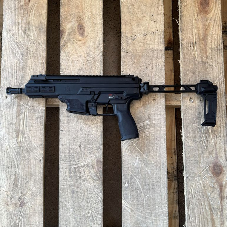 Springfield Armory Kuna 9mm PCC pistol with 6 inch threaded barrel, M-LOK handguard and folding brace in black, in store left