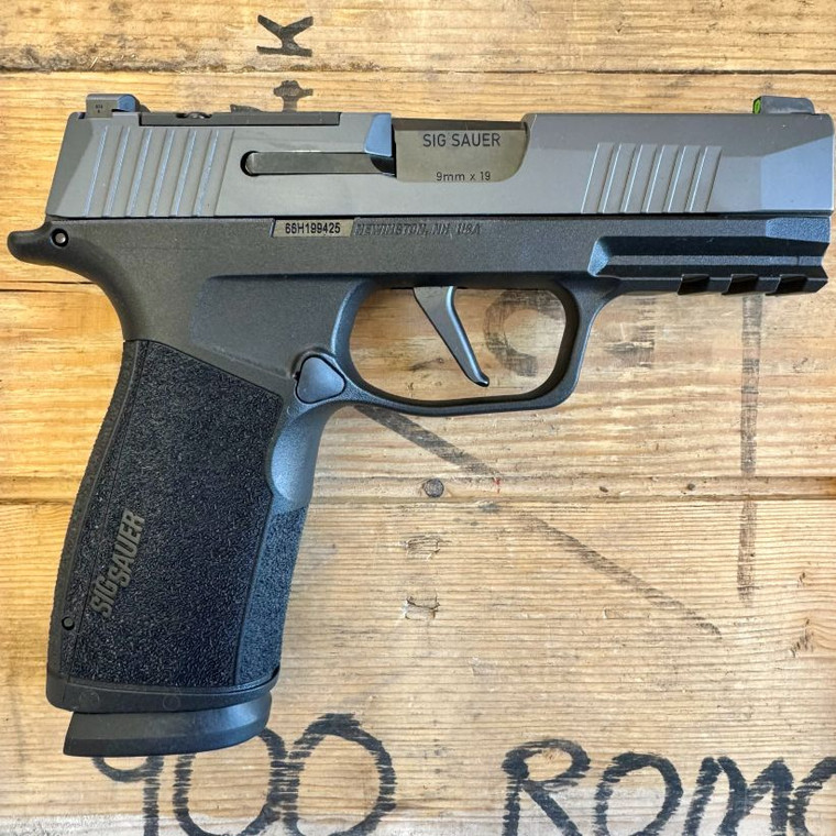 SIG Sauer P365X-Macro TACPRO 9mm optics ready pistol with XRAY3 sights and extended capacity magazines, pointing to the right