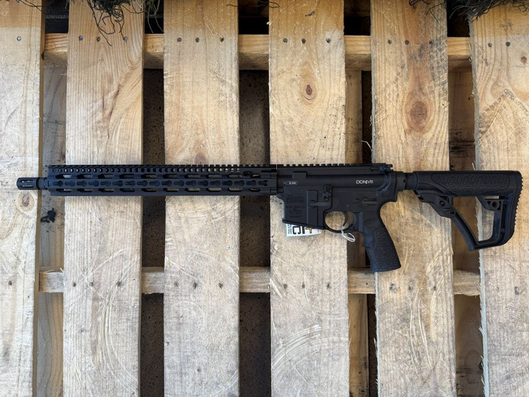 Daniel Defense DDM4 V11 AR-15 rifle with 16 inch cold hammer forged barrel and KeyMod SLiM Rail handguard pointing to the left